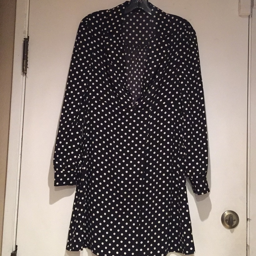 Black polka-dot mid-dress